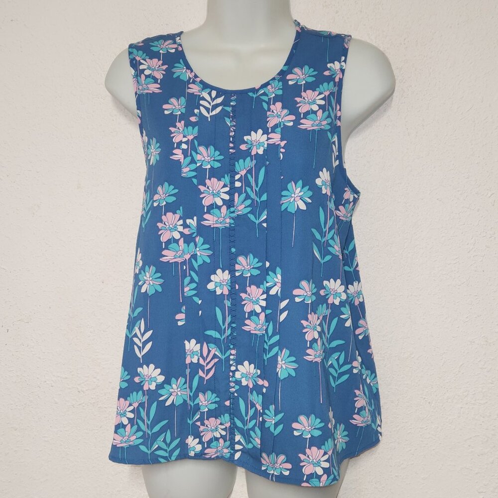 Q&A **stylish sleeveless top, Blue with floral design. Size Small